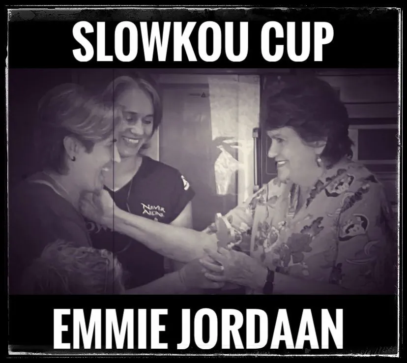 Two women laughing together, captioned Slowkou Cup and Emmie Jordaan.
