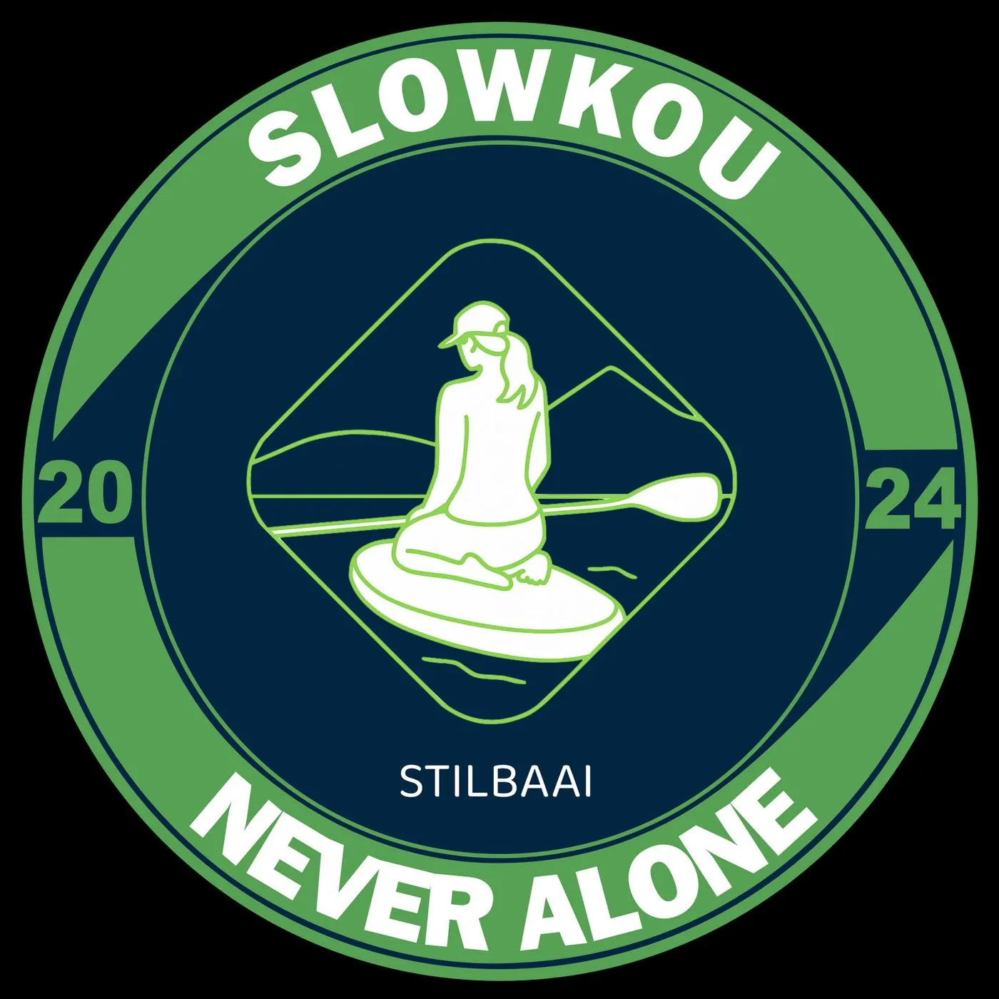 A round green and white badge reading Slowkou Stilbaai, Never alone, with a woman on a paddle board.