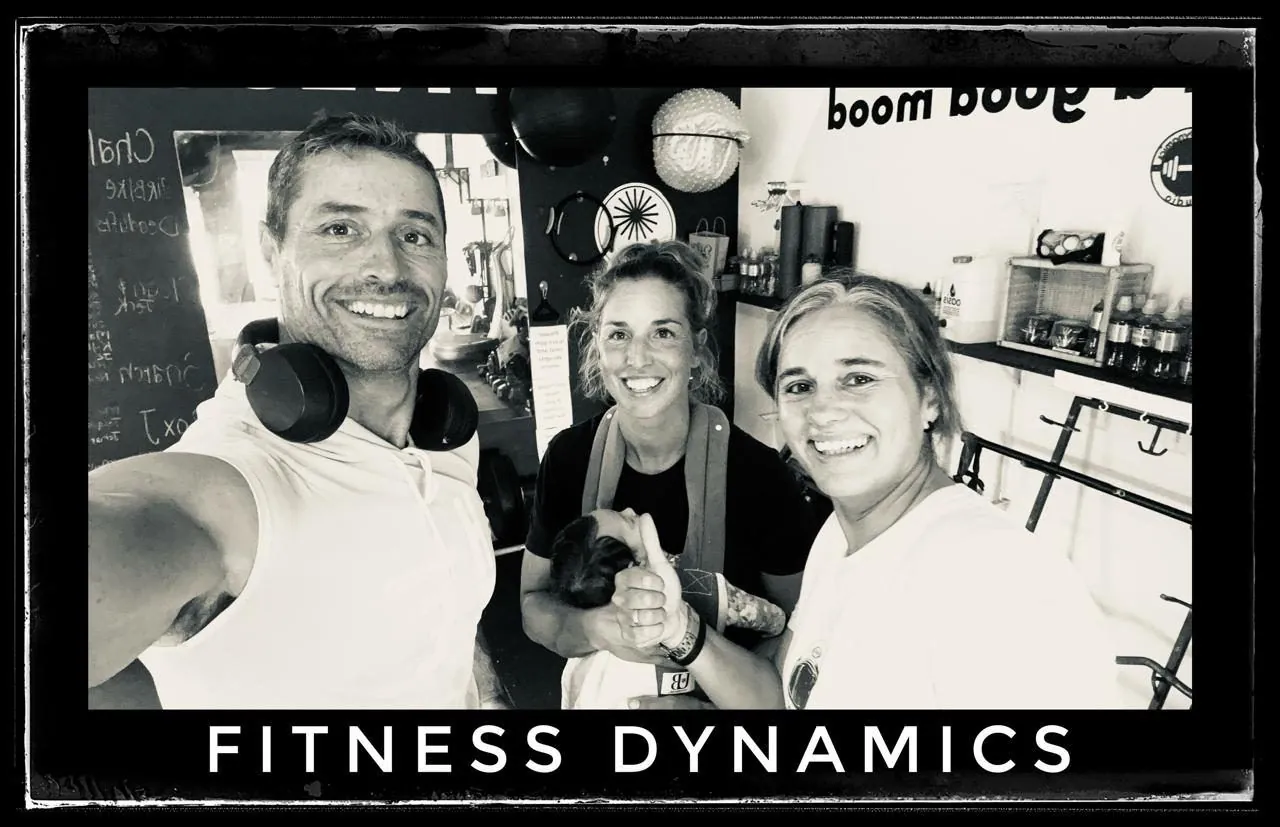 A black and white photo of three people taking a selfie, captioned Fitness Dynamics.