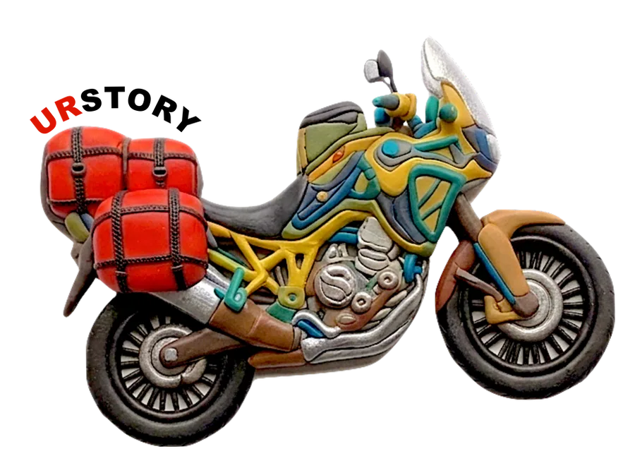The URstory logo: a colourful painted motorbike with red panniers and the word URstory arched above it.